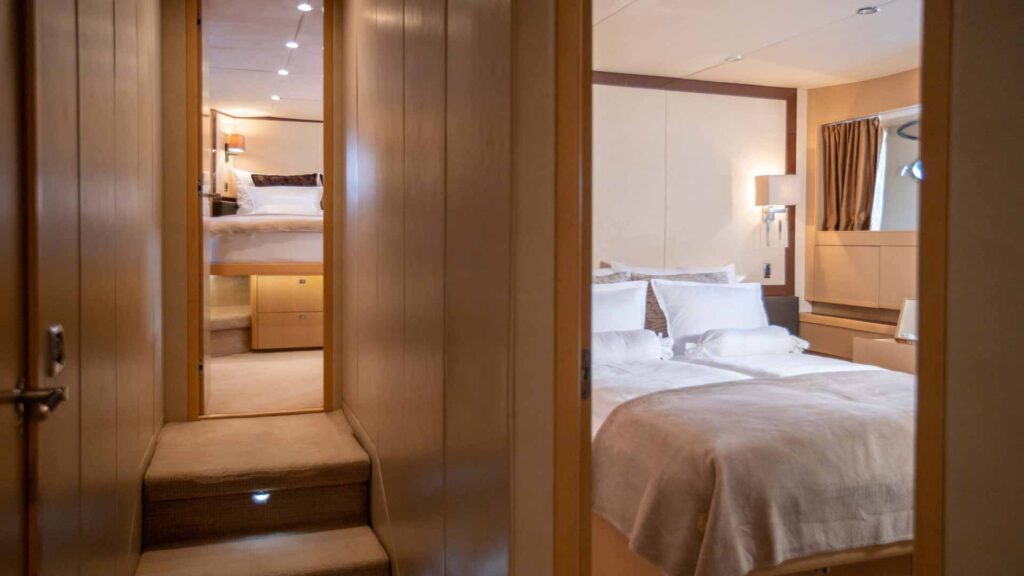 view of the two cabins onboard insieme yacht charter