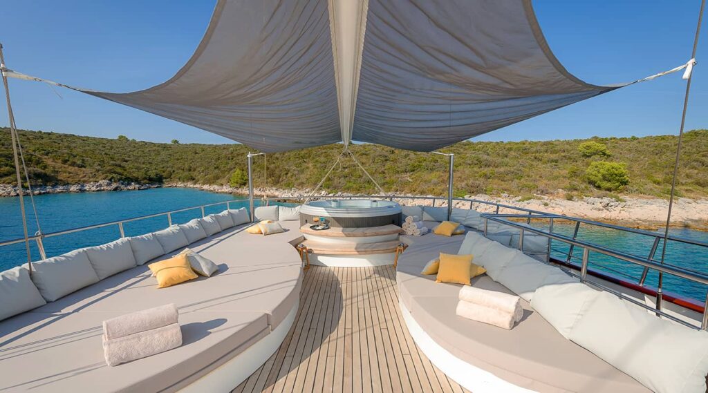 lady gita yacht sundeck area with a jacuzzi, cover for additional shade