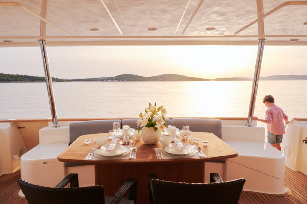friends boat yacht charter main deck aft dining area