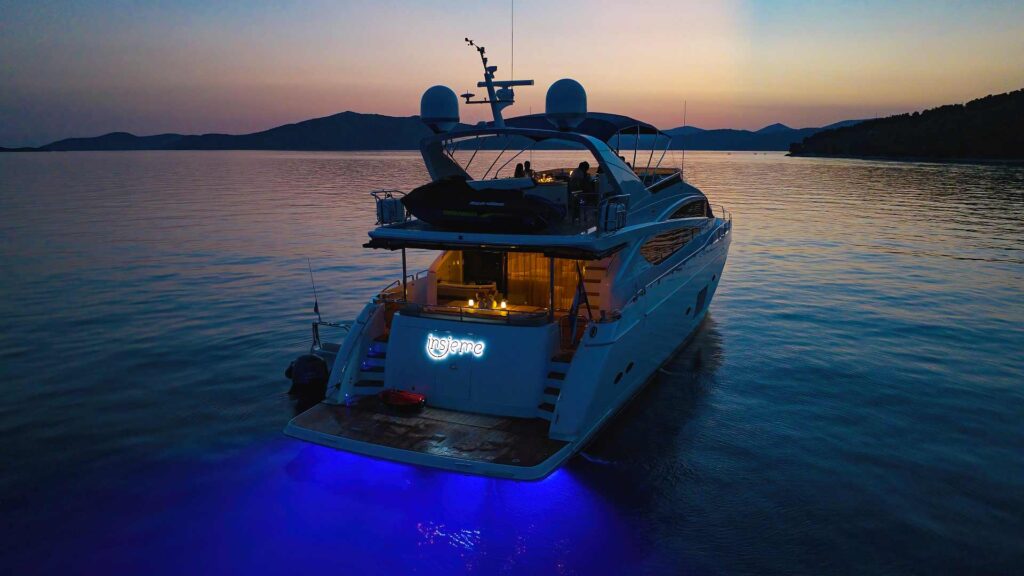 insieme yacht charter rear view at night