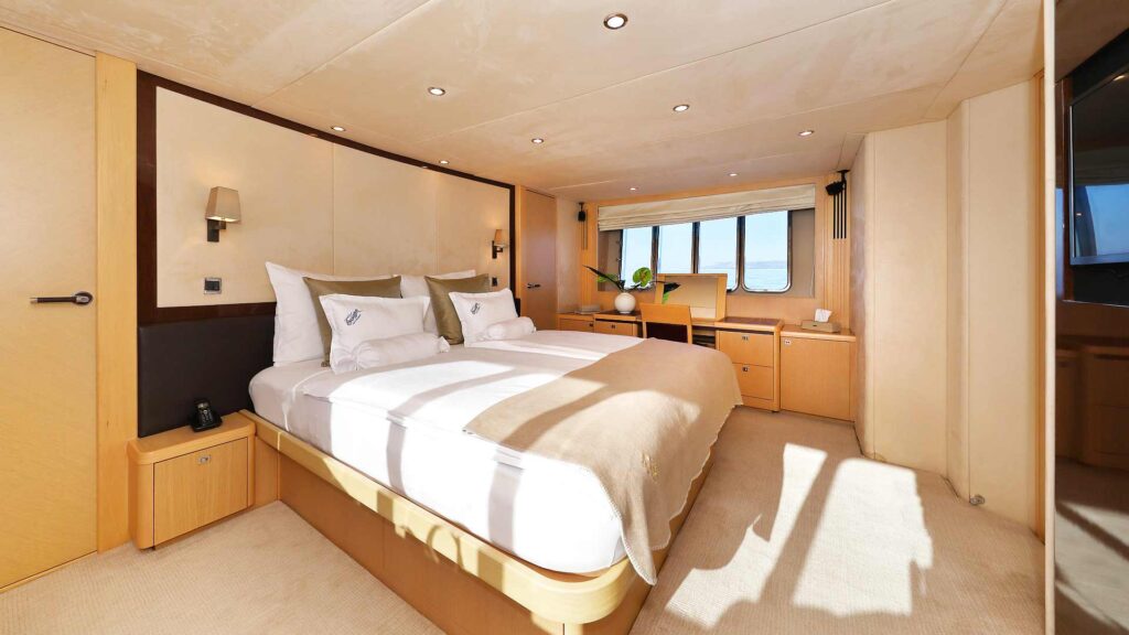 insieme yacht charter master suite with a king size bed