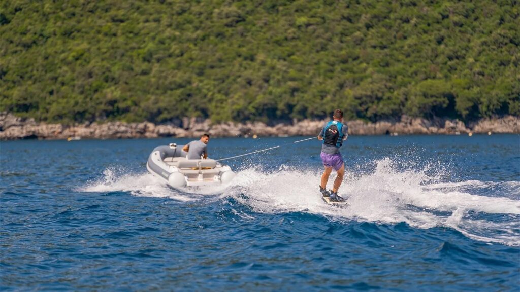 tender towing a wakeboard water toy