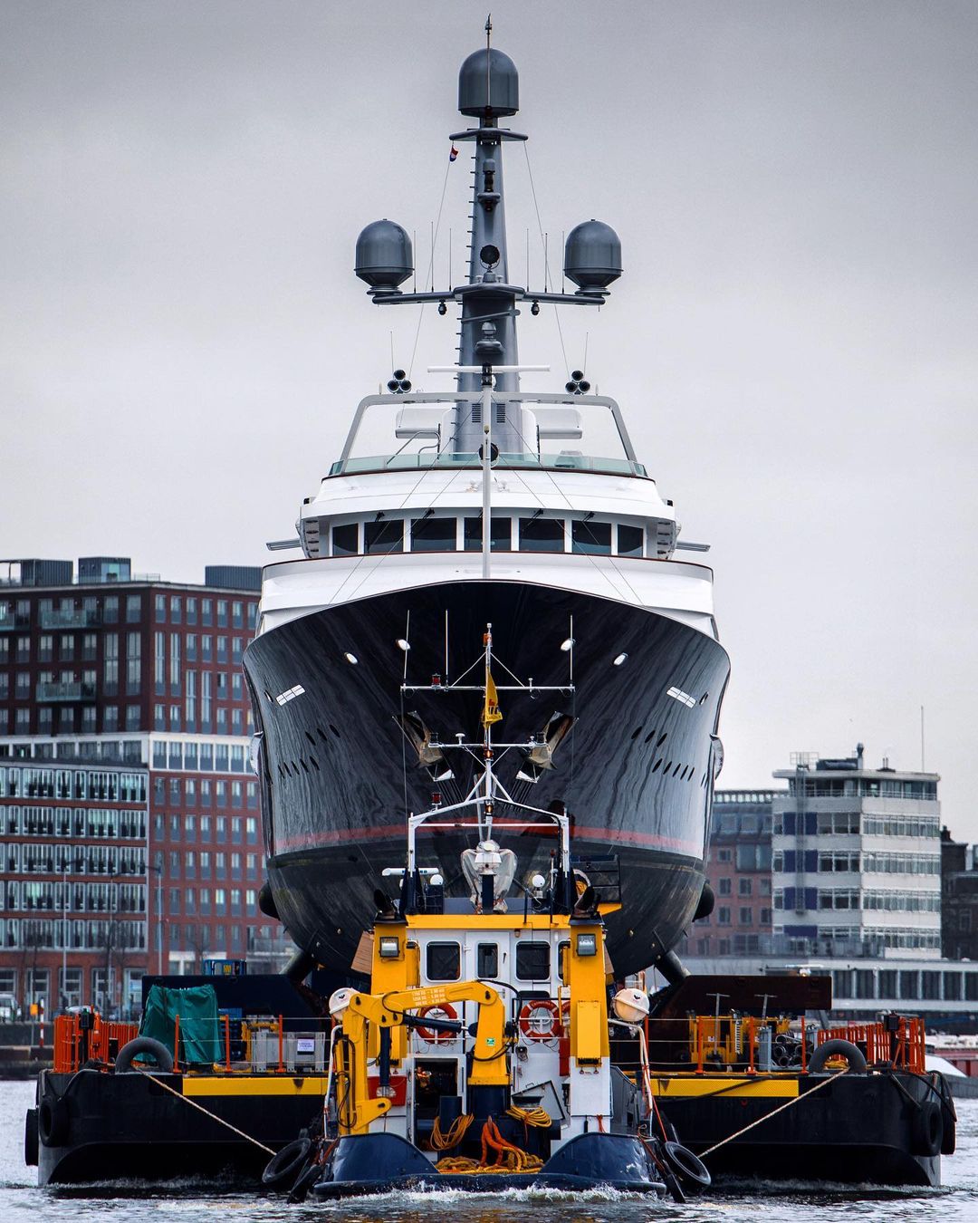 Amara yacht charter after her refit, being towed