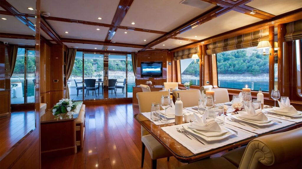 Rebecca V yacht charter indoor dining area