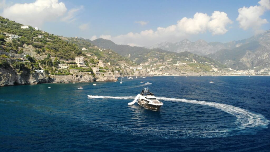 jet ski cruising around the yacht vivaldi in the sea