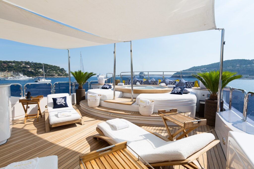bina yacht sundeck jacuzzi lounge with bimini for shade
