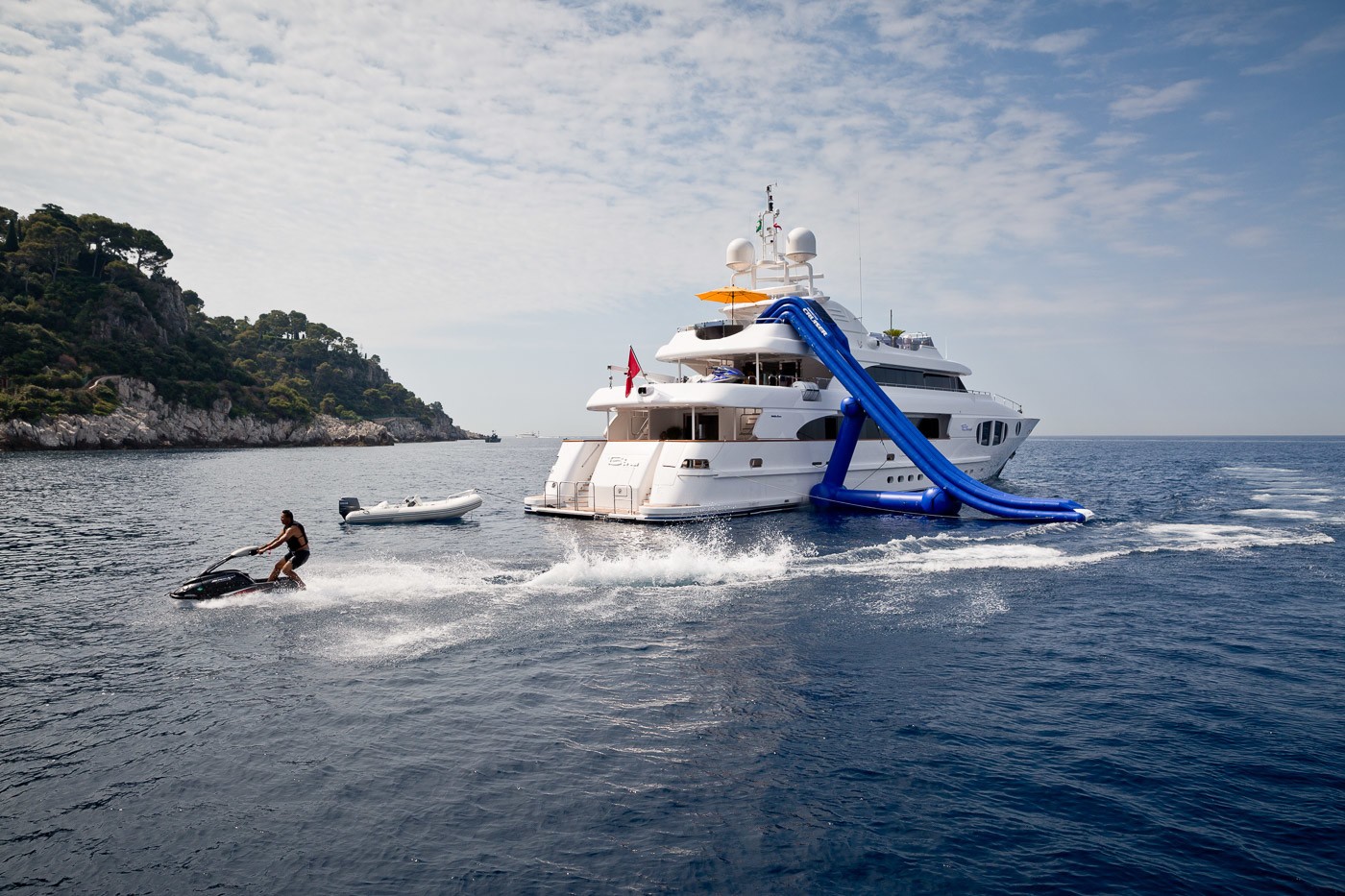 yacht with a water slide, stand up jet ski