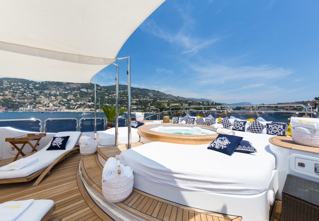 jacuzzi surrounded with sunpads on a yacht
