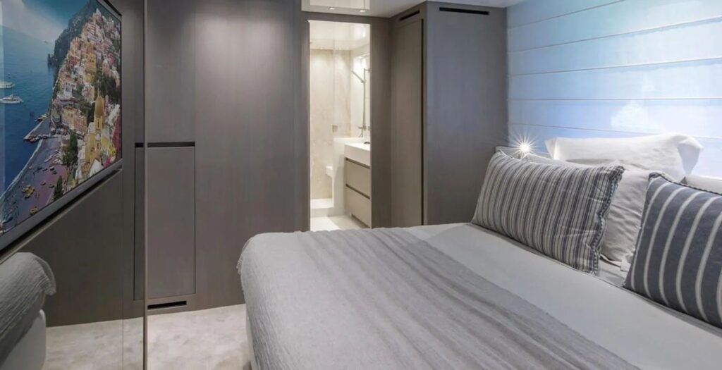 double bed on a yacht with en suite view