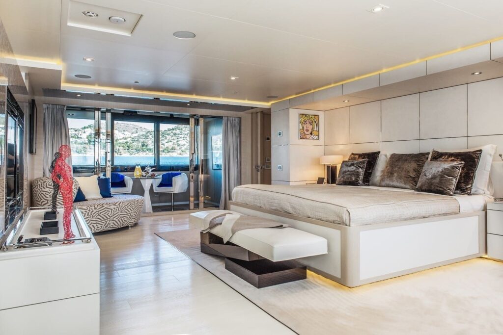 light holic yacht master suite with a king size bed, private lounge