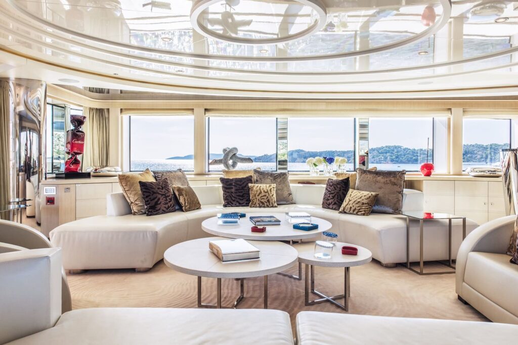 sky lounge on a light holic yacht, 3 round desks & sofas
