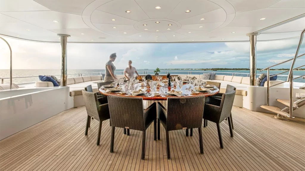 loon yacht charter upper deck dining table