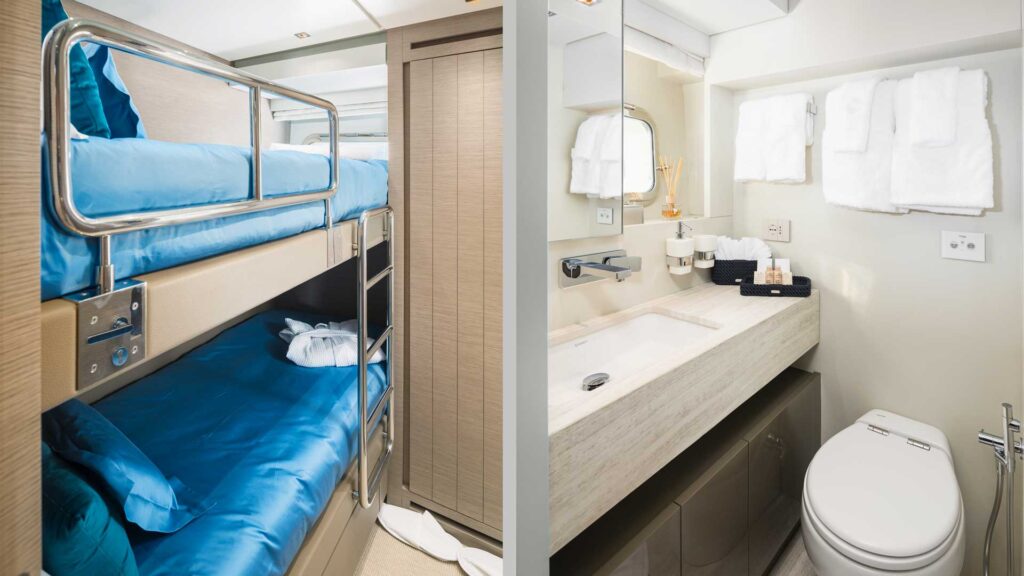 bunk bed cabin on a yacht with an en suite