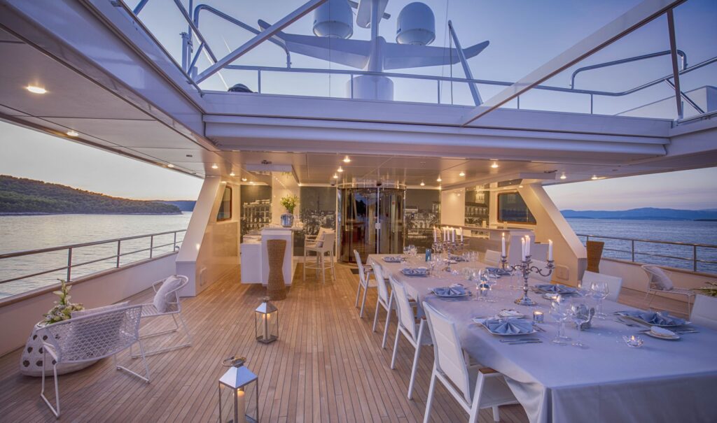 katina yacht charter aerial view dining table