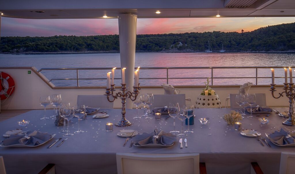 katina yacht charter aerial view dinner