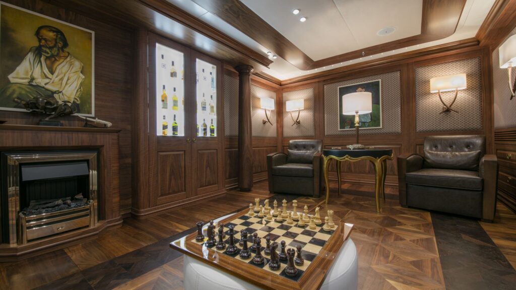katina yacht charter chess in whiskey room