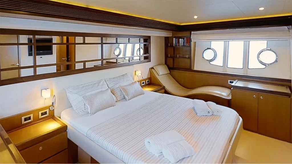 amy yacht charter master suite with a king size bed