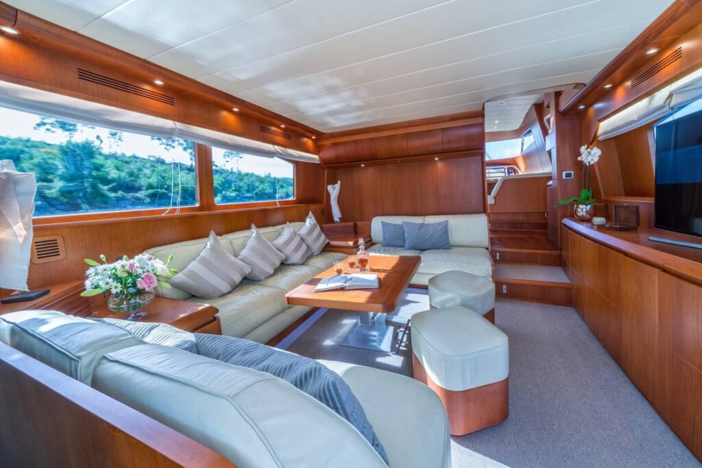 jantar yacht charter salon sofas and tv