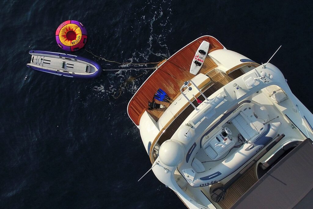 jantar yacht charter swimming platform kayak and donut