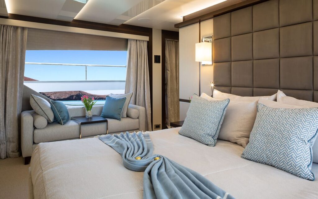 mr k iriston yacht charter master suite with a private sofa