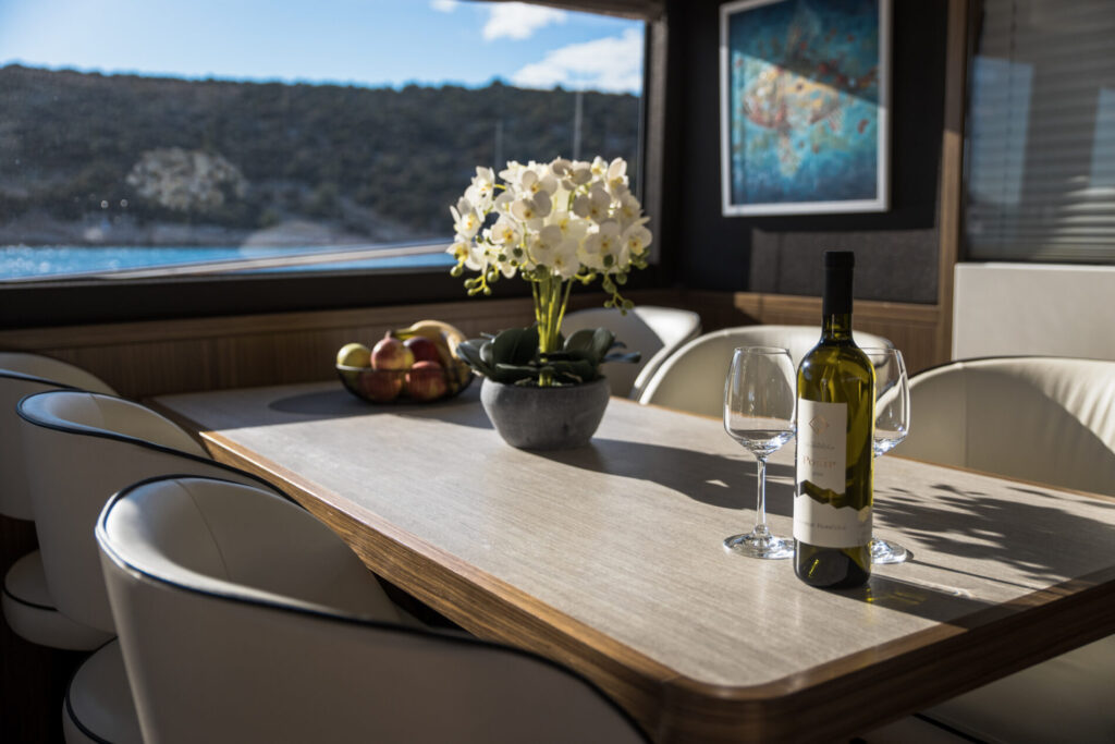 bollinger yacht charter salon dining table