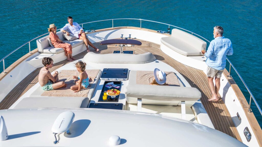 panta rei yacht charter guests on the front sundeck
