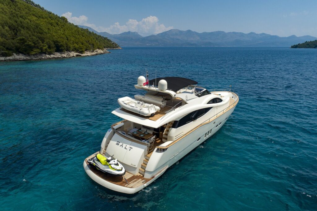 salt yacht charter rear view with a jet ski