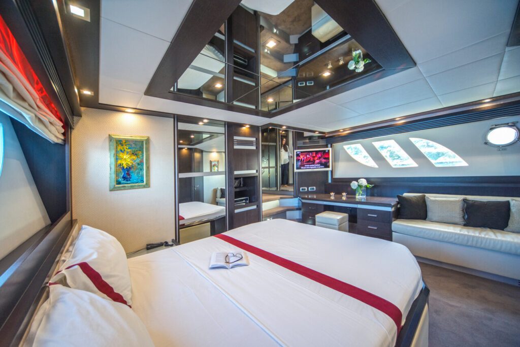 discovery yacht charter master suite bed