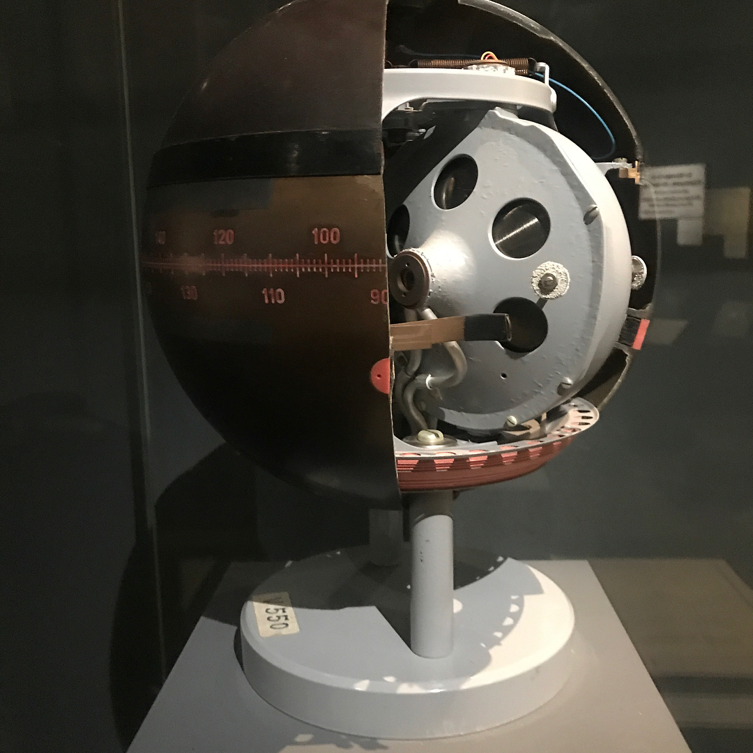 A gyroscope on display in a case