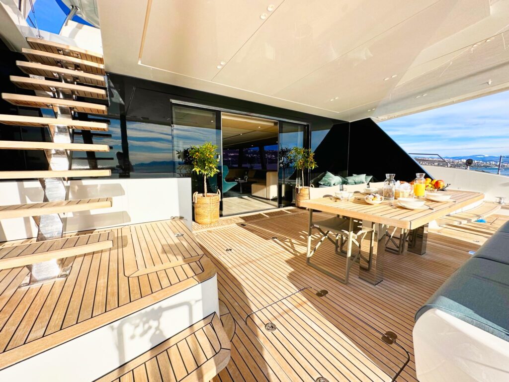 nala one catamaran yacht aft deck dining table