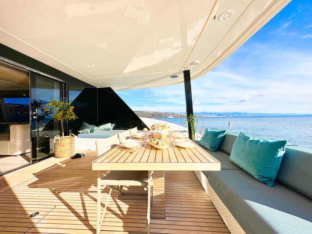 nala one catamaran yacht aft dining area & lounge