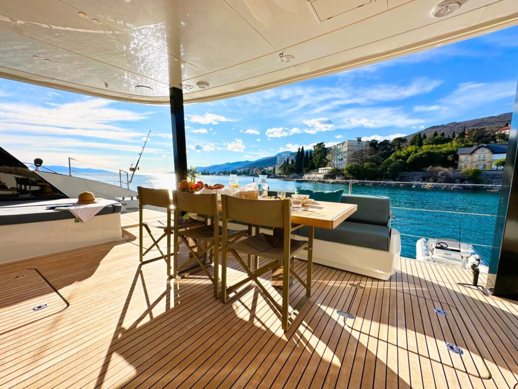 nala one catamaran yacht al fresco dining table