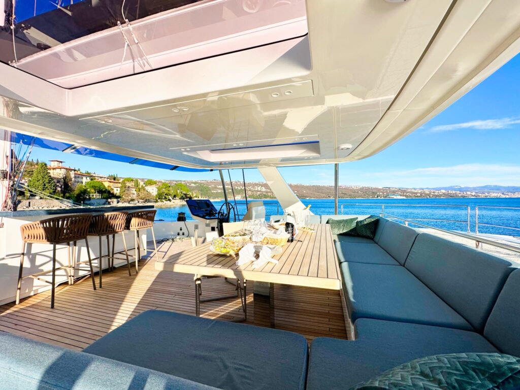 nala one catamaran yacht sundeck al fresco dining table