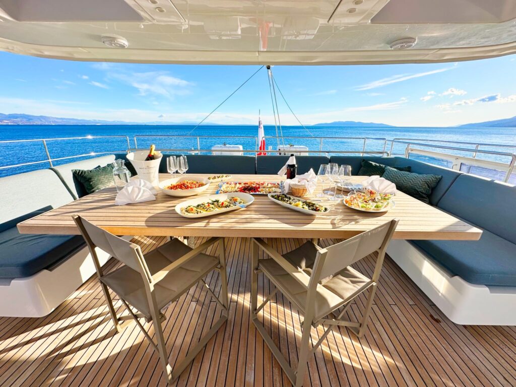 food platter & champagne bottle on the al fresco yacht dining table