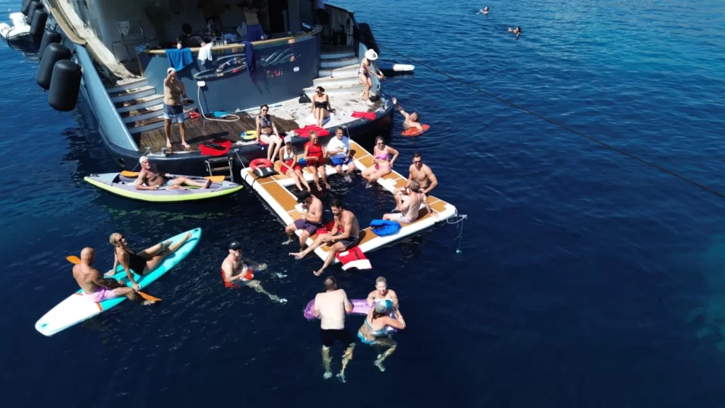 bella yacht charter guests having fun