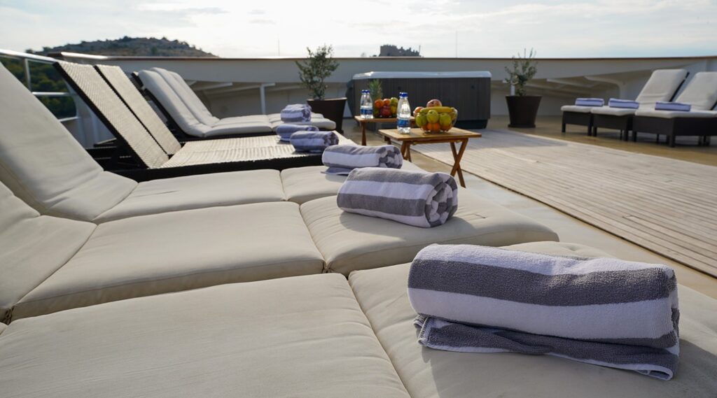 karizma yacht charter sun loungers with towels