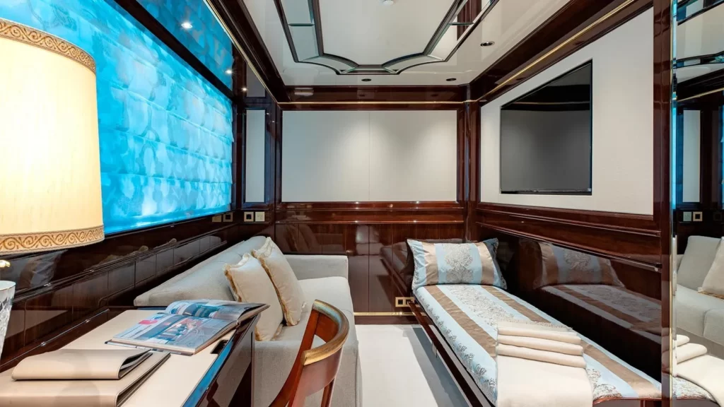 lady lena yacht charter cabin with a sofa & pullman bed