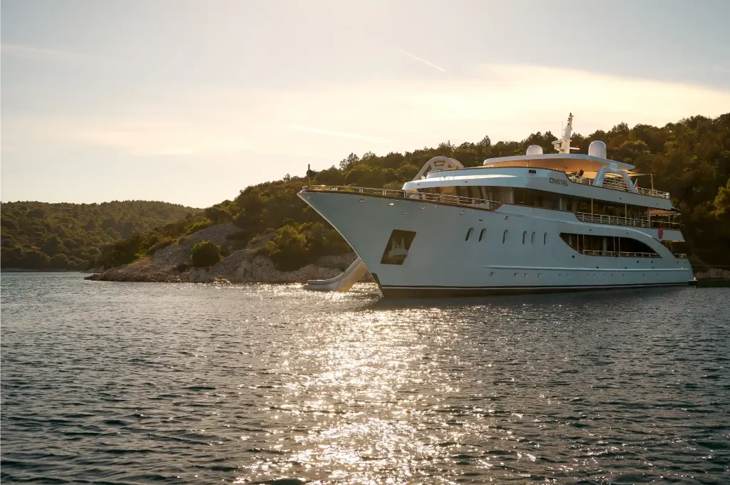 cristal yacht charter at sunset